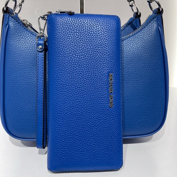 MICHAEL KORS Lg Pebbled Leather Continental Wallet Wristlet Phone
Galaxy Blue - Picture 5 of 16